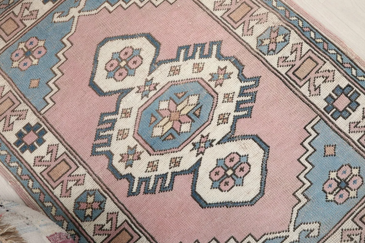 Angled view highlighting the central medallion and surrounding geometric designs