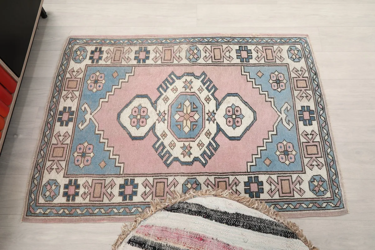 Top-down view of the rug in the room, showing its placement relative to furniture
