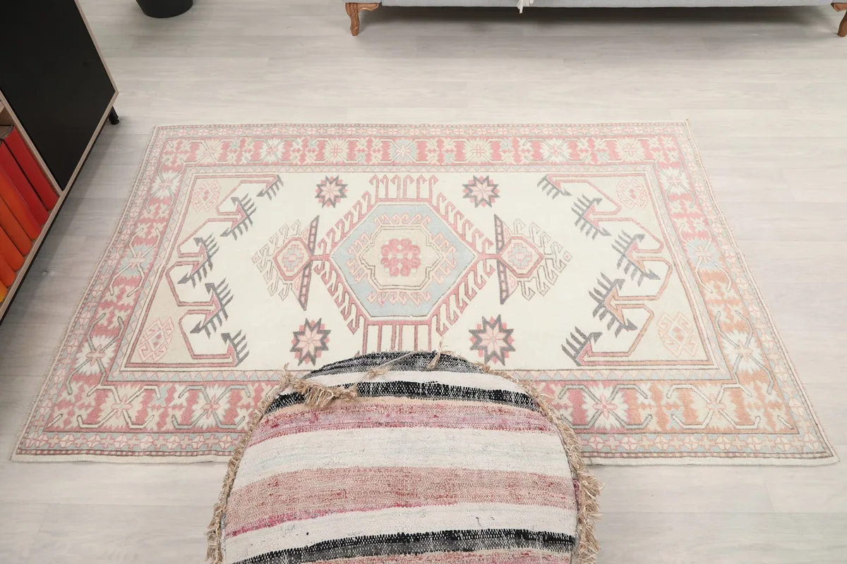 Full overhead view of the rug on the floor, showing its dimensions and overall design