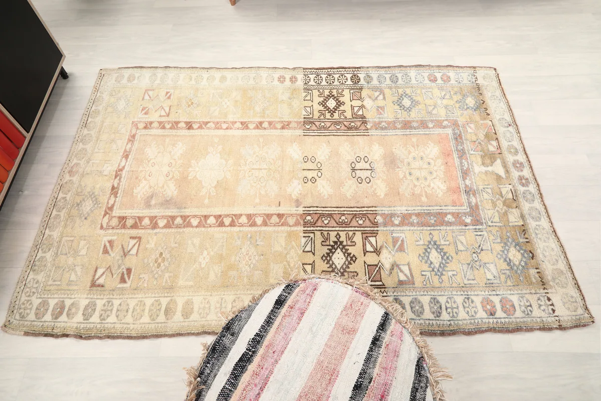 Faded Rose Tribal Anatolian Rug from a higher angle, illustrating its size and impact in a room.