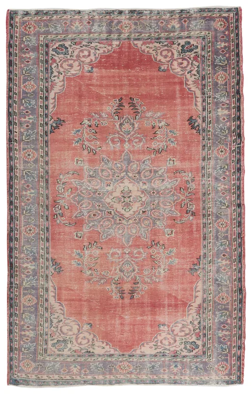 Full overhead view of the 6'11" x 9'8" vintage Anatolian rug with a rose field and gray border.
