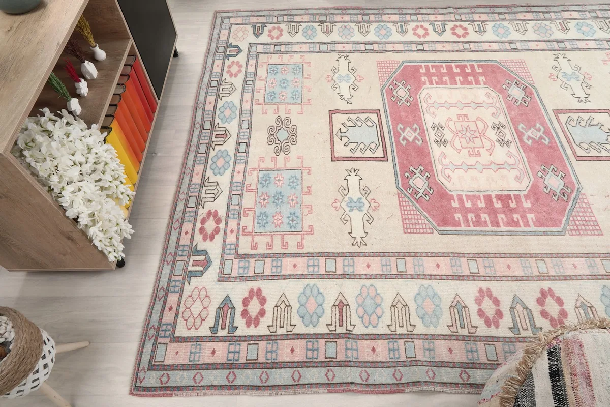 Wide angle view of the rug in a room, emphasizing its size and overall impact