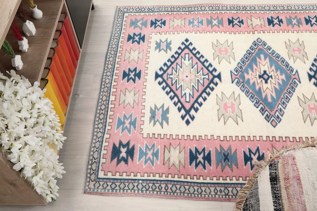 View of the rug from an elevated angle, showcasing the full pattern and color scheme
