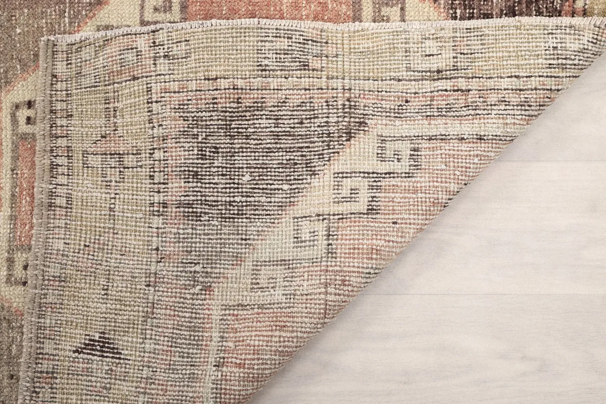 Another view of the rug's back, revealing the tight knotting and construction