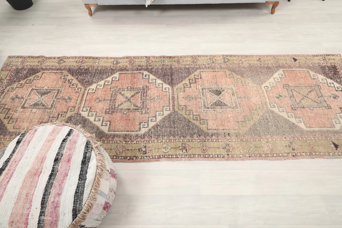 Full overhead view of the runner in a room, emphasizing its length and pattern flow