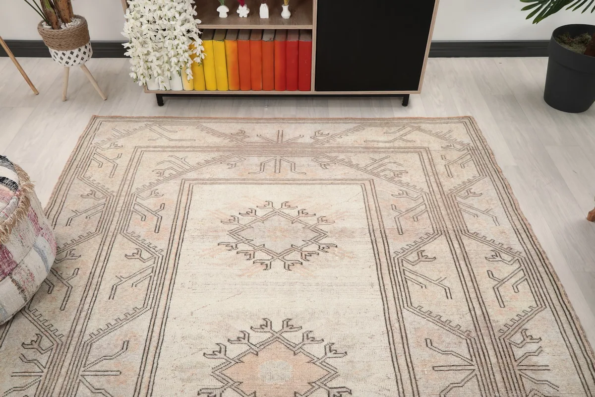 Angle view of the rug complementing a minimalist room with a wooden cabinet