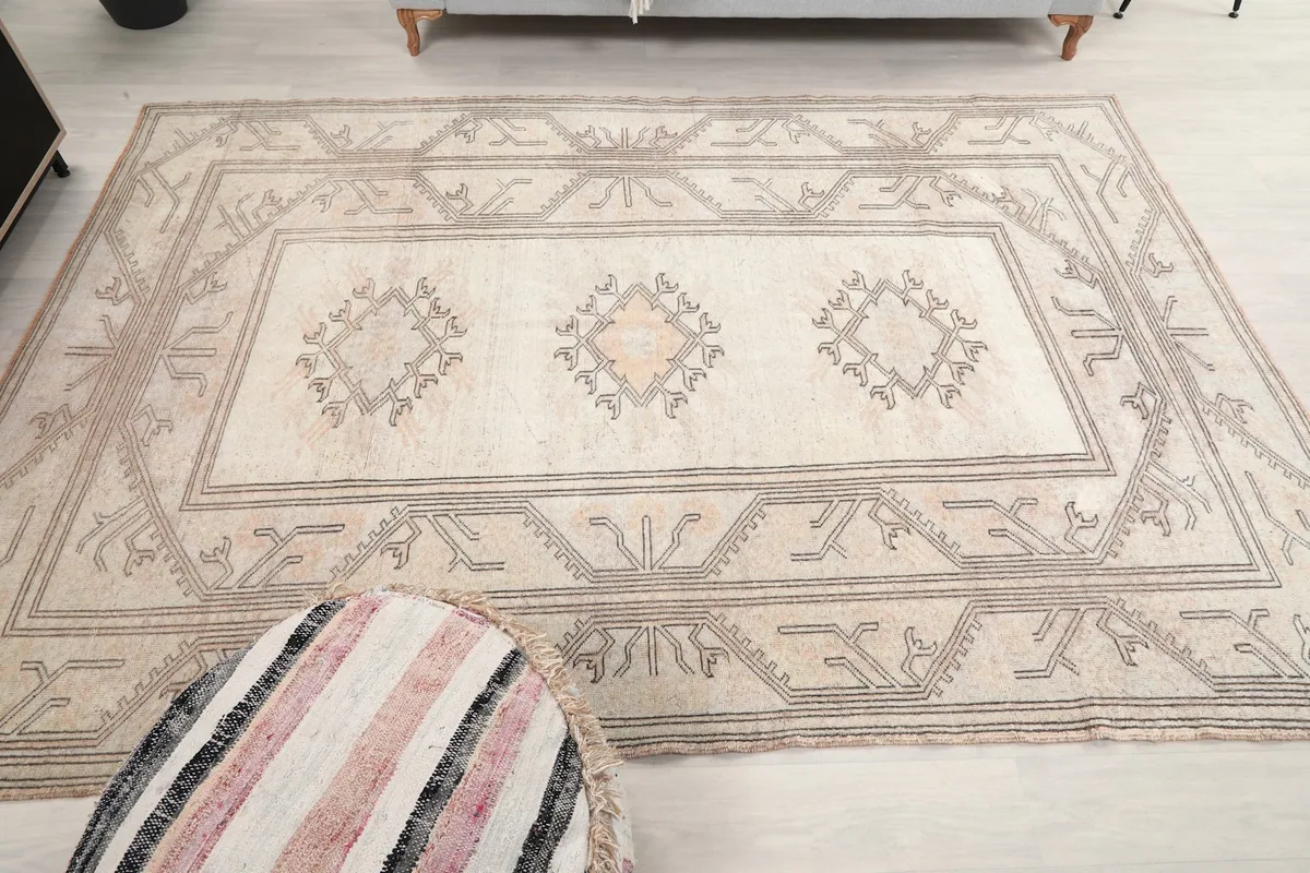 Overhead view of the rug displaying its full pattern and color variations in a room