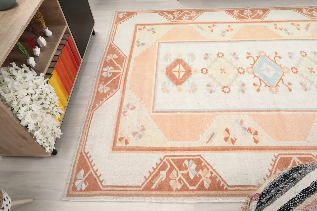 Angled view of the rug from above, showing its placement in a room and overall design