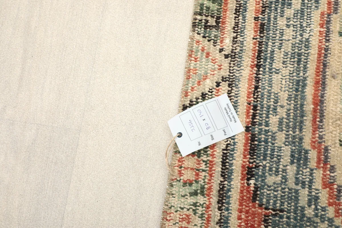 Label attached to the back of the vintage Anatolian rug, showing product information