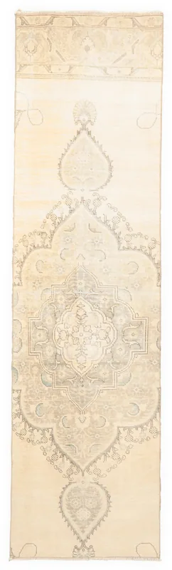 Full overhead view of the 2'9" x 10'4" ivory and gray vintage Anatolian runner rug