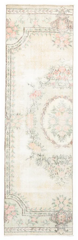 Full top view of the vintage Anatolian runner rug on a white background