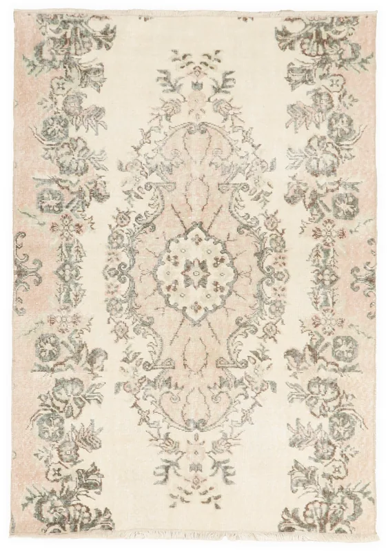Full top view of the vintage Anatolian rug with cream field and rose accents on a white background