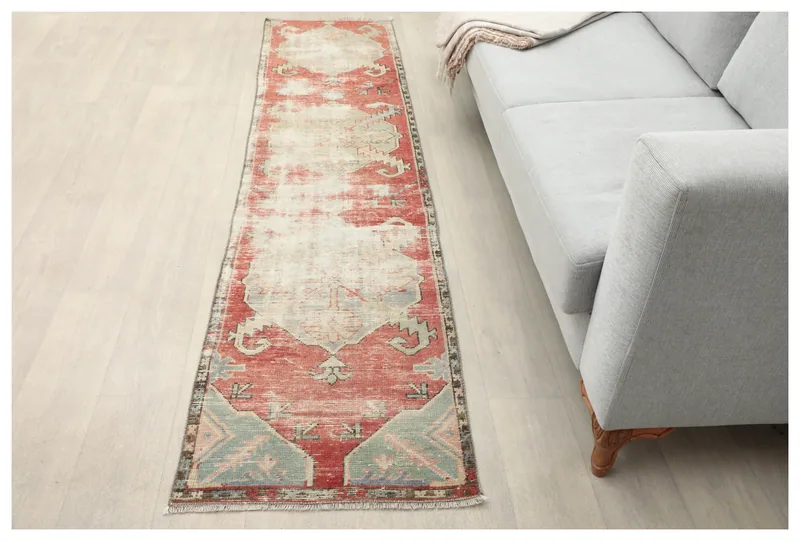 Full top view of the 1'11" x 8'3" vintage Anatolian runner rug on a white background.