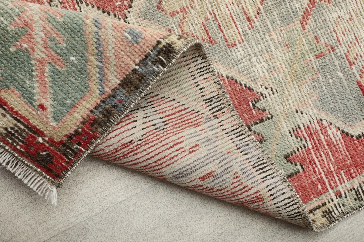 Another view of the rug's underside, showcasing the tight knotting and craftsmanship.