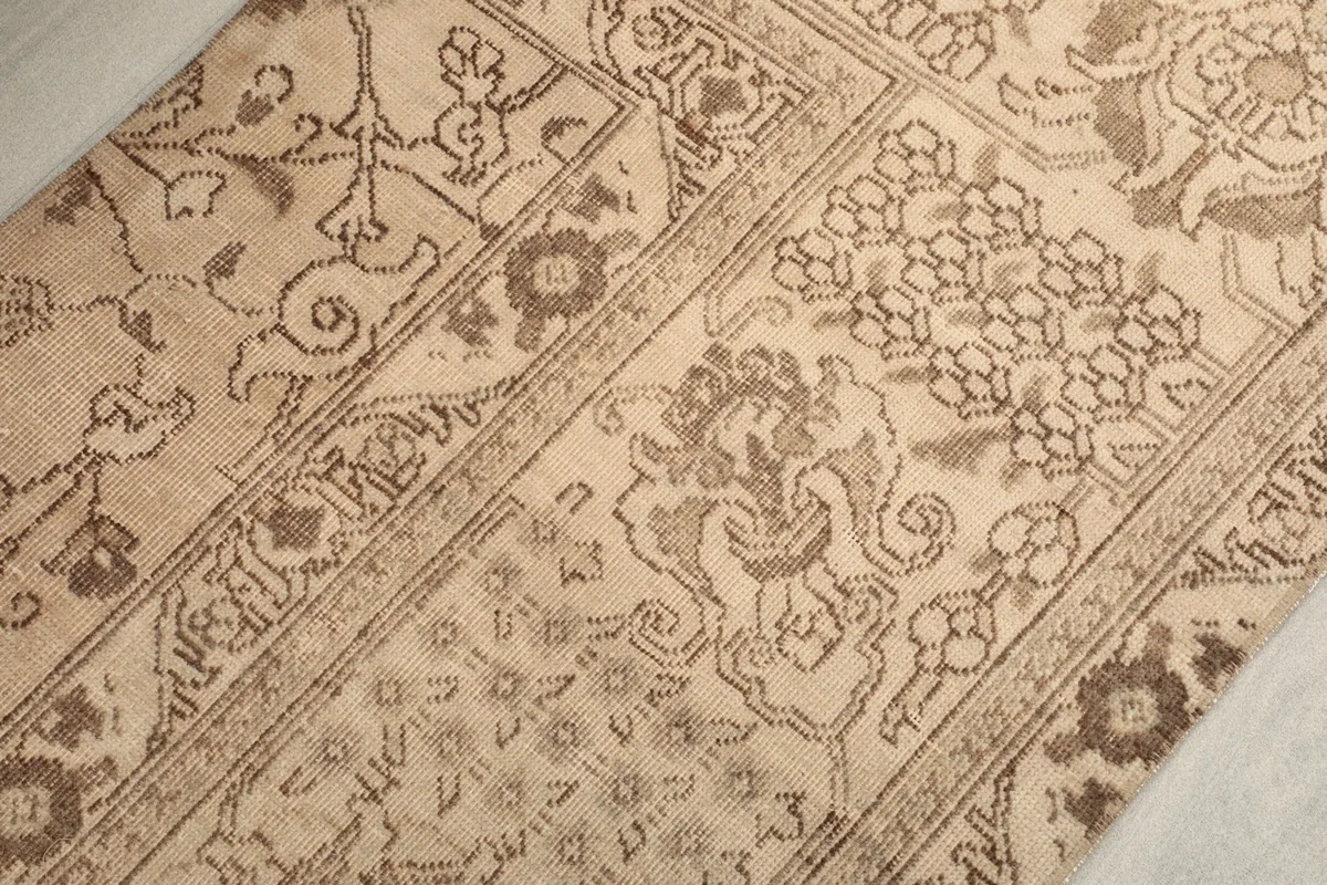 Close-up showing the varied beige and brown tones and intricate patterns
