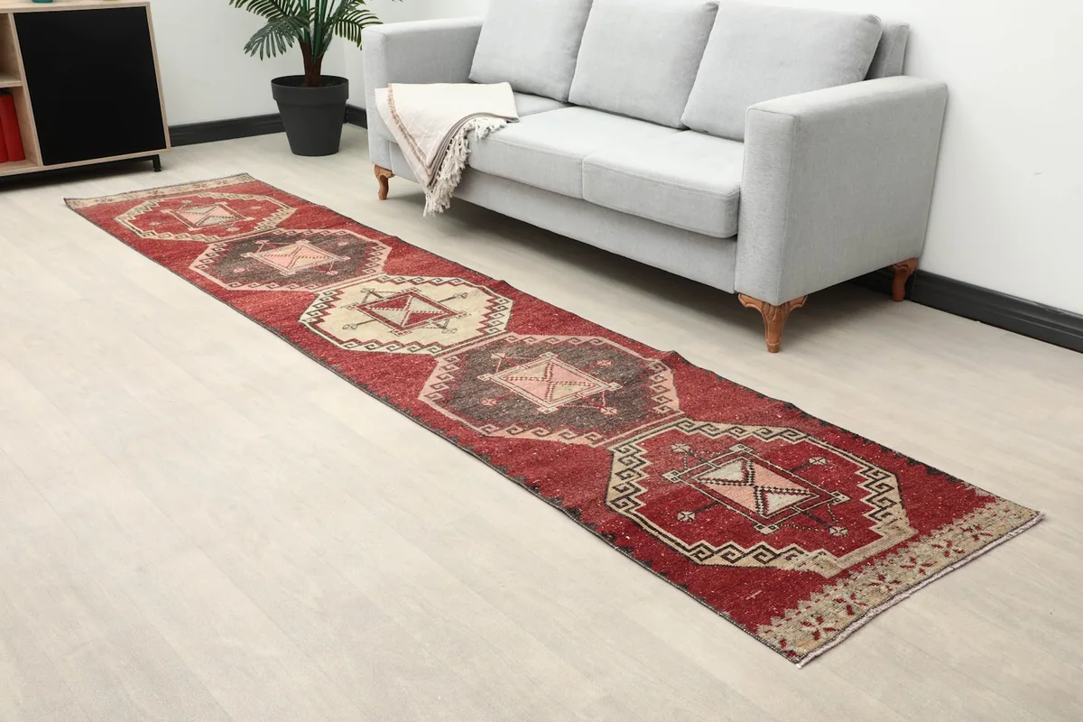 Overhead view of the runner rug in a room, highlighting its placement and design along a pathway