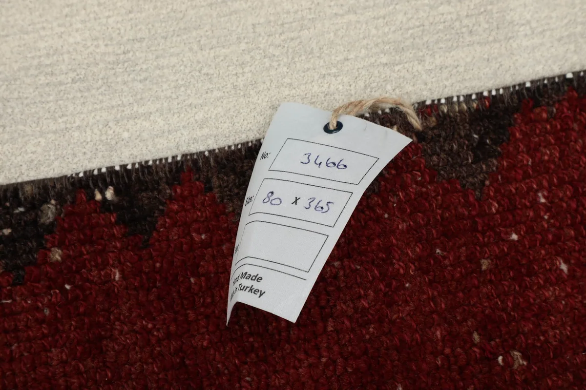 Close-up of the rug's tag with size information and 'made in Turkey' detail