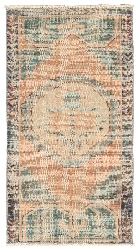 Full top view of the vintage orange and green Anatolian area rug