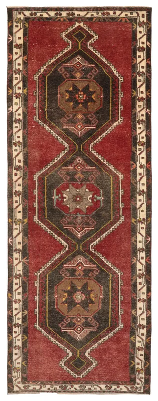 Full top view of the vintage Anatolian runner with rust and black geometric patterns