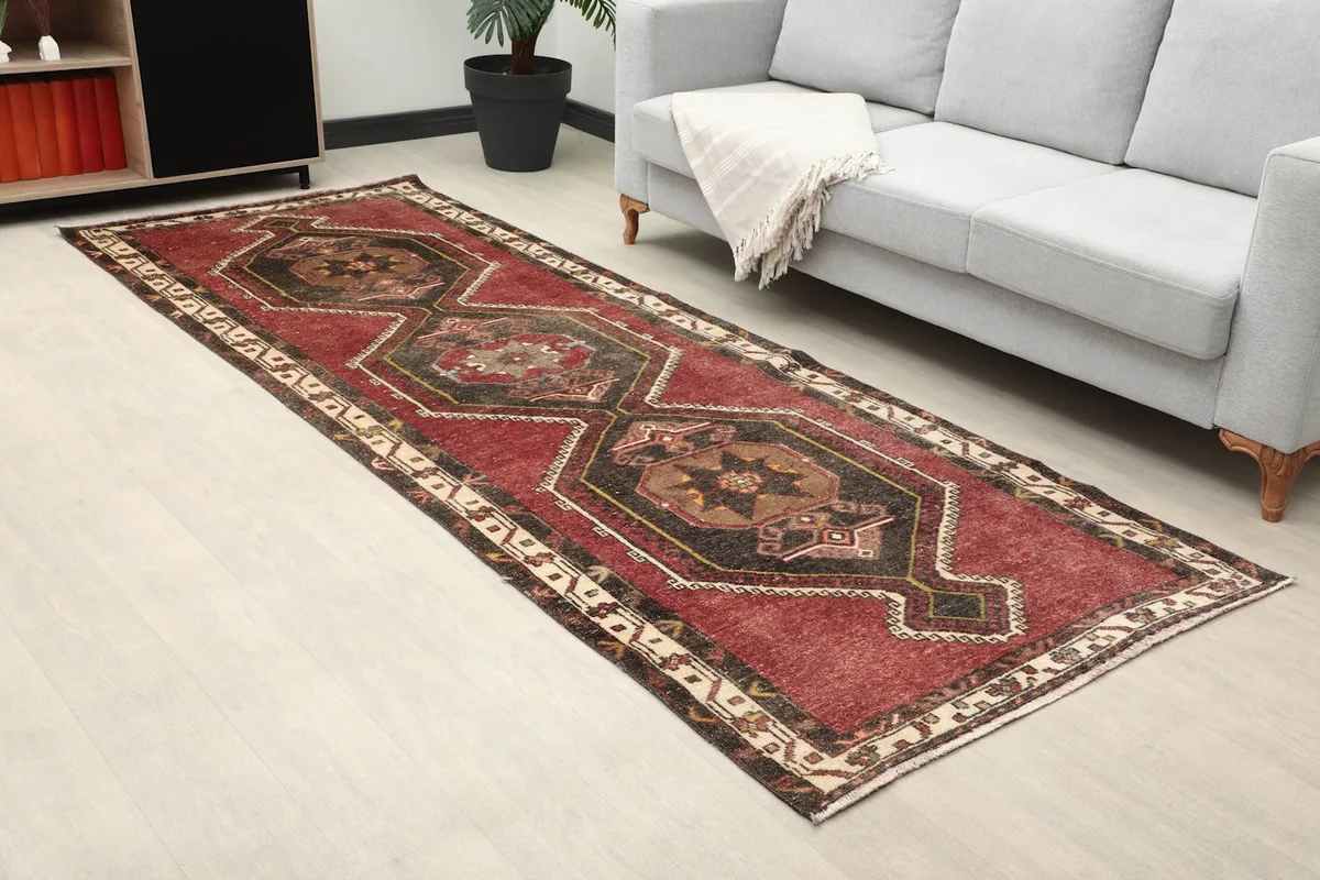 Angled view of the runner on a light floor, showing its length in a room