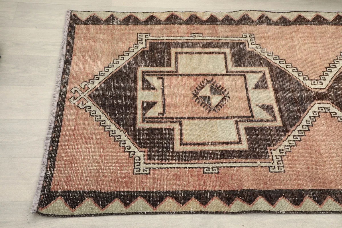Detailed view of the runner's pattern and subtle color variations near the edge
