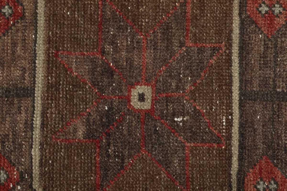 Close-up of the low wool pile, showing texture and subtle color variations