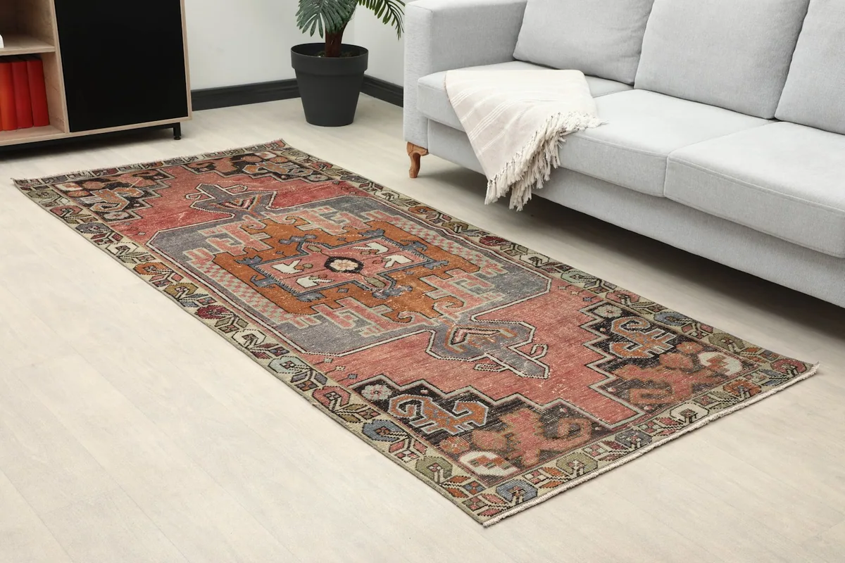 Close-up room view of the rose runner rug, highlighting its placement and surrounding decor