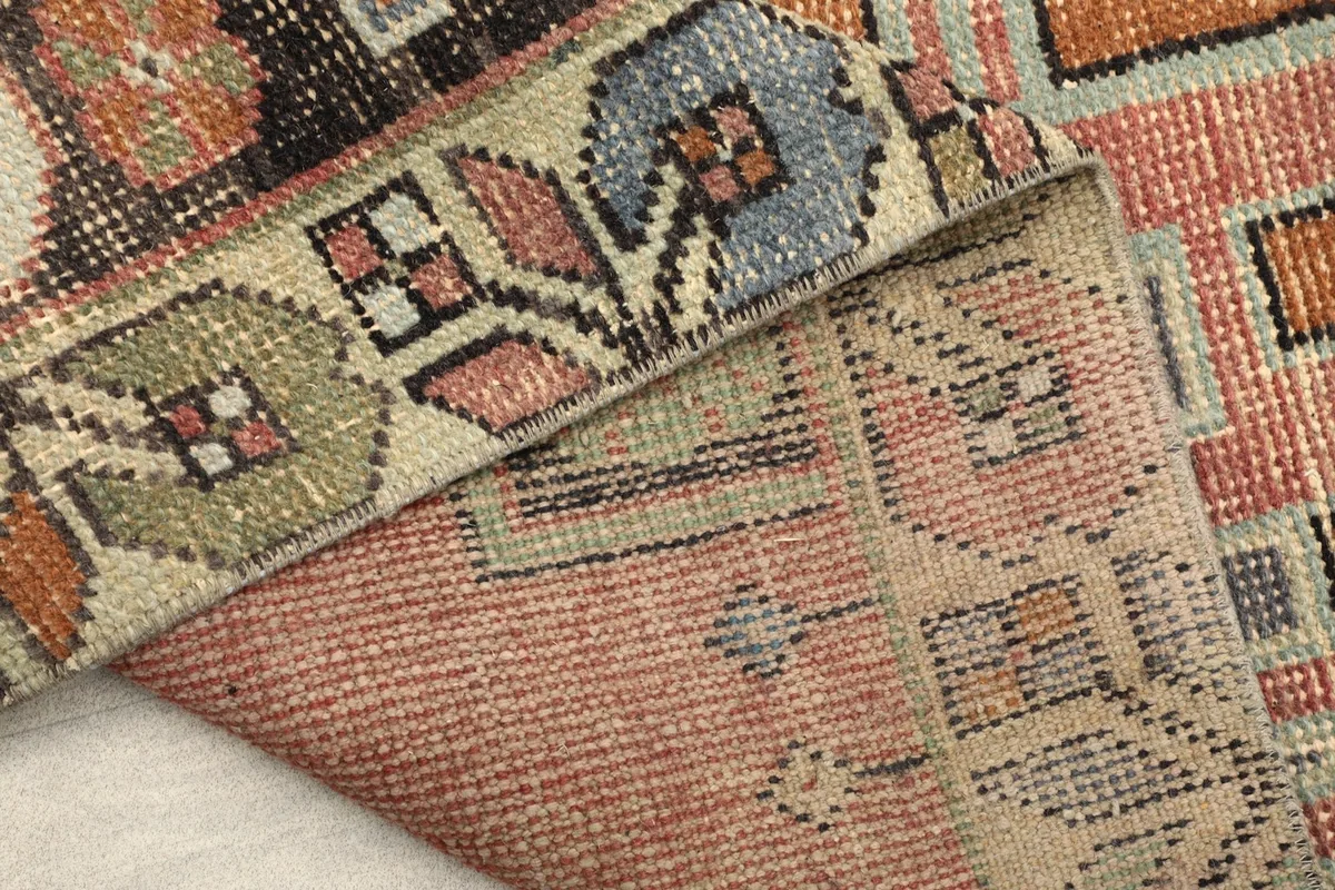 Close-up of the back of the rug, illustrating the dense knotting and craftsmanship