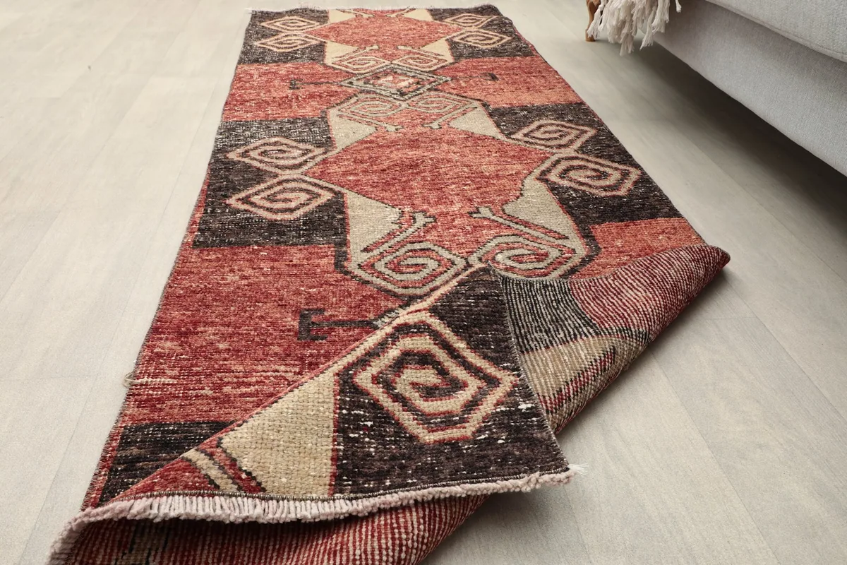 Runner partially folded to demonstrate its flexibility and the consistent pattern throughout