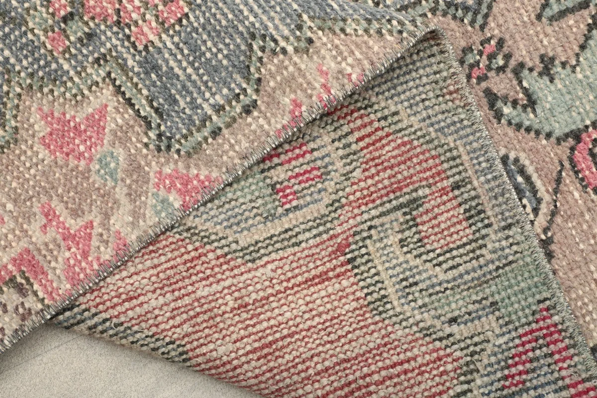 Close-up of the back of the rug, revealing the tight hand-knotted weave