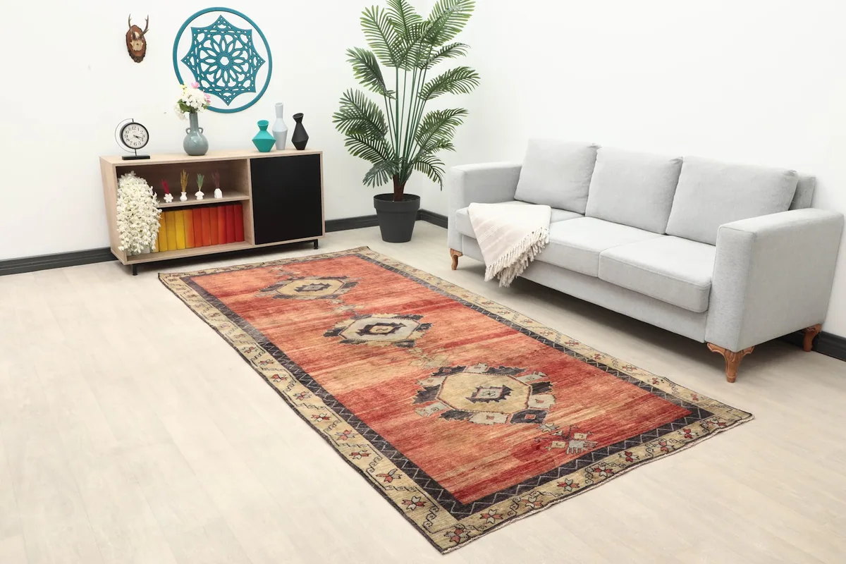 Long view of the red runner rug in a room with modern furniture and decor
