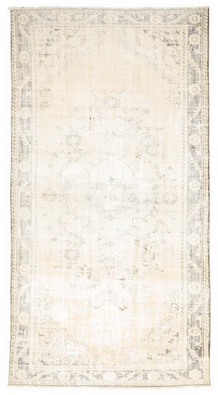 Full top view of the 6x11 ivory and gray vintage Anatolian rug on a white background