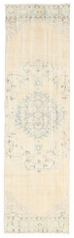 Full top view of the vintage Anatolian runner rug on a white background.