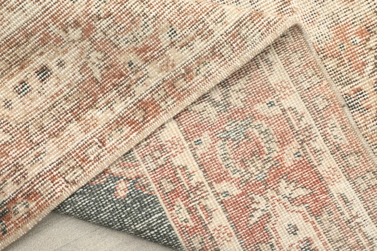 Another perspective of the rug's reverse side, emphasizing the quality of the hand-knotted work.