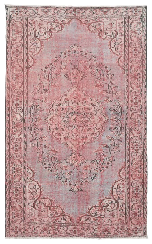 Full overhead view of the 6x10 vintage Anatolian area rug with rose and blue tones