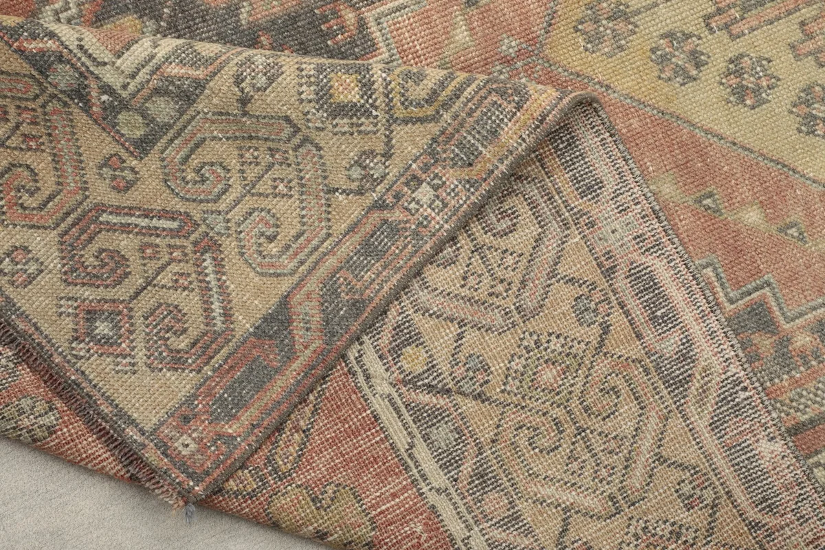 Another folded view showing the intricate details and texture of the wool pile