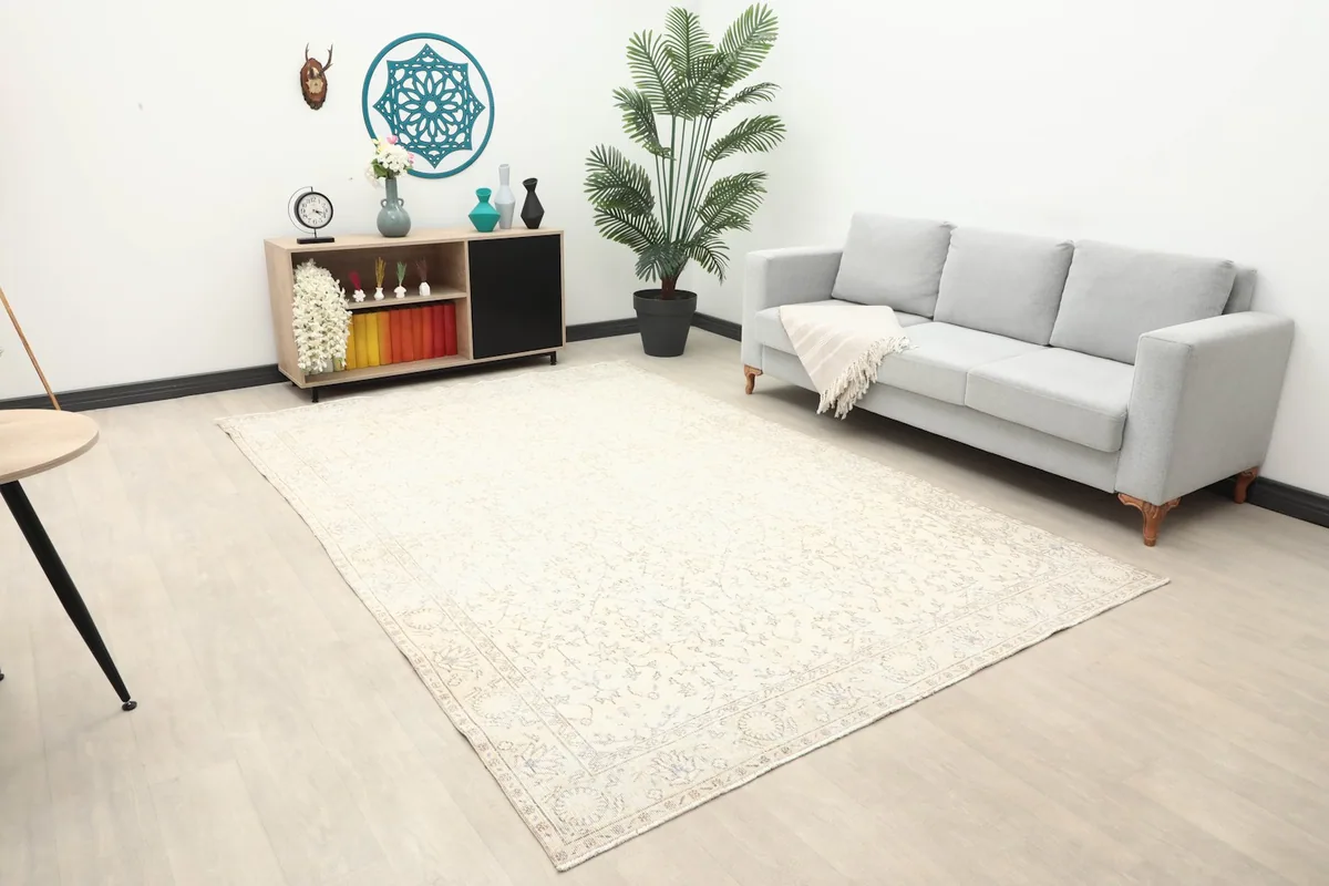 Wide view of the ivory area rug in a light-filled living space