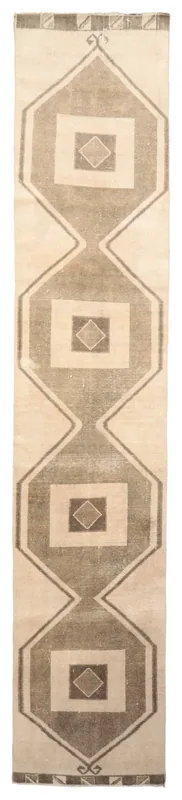 Full overhead view of the 3x15 ivory and tan geometric vintage runner rug.