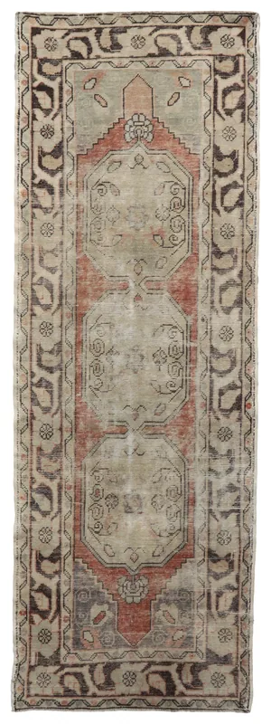 Full overhead view of the 3'1" x 8'11" vintage Anatolian runner rug with beige, rust, and gray geometric patterns.
