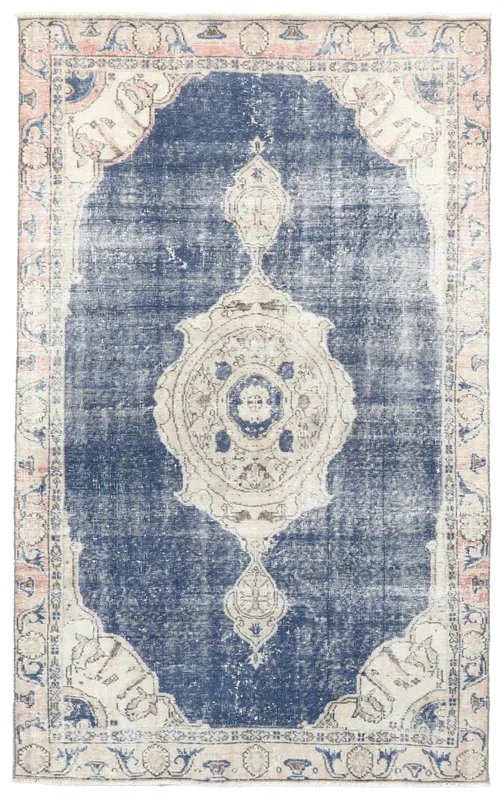 Full top view of the 4'6" x 7'3" navy medallion vintage Anatolian rug on a white background.