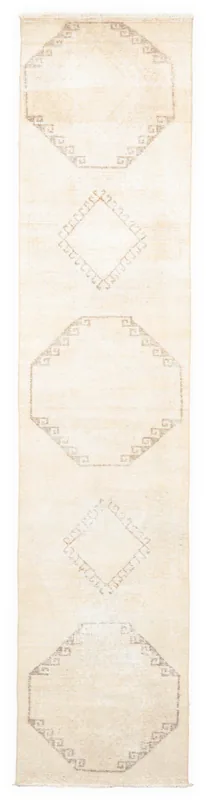 Full overhead view of the beige Anatolian runner with brown geometric patterns