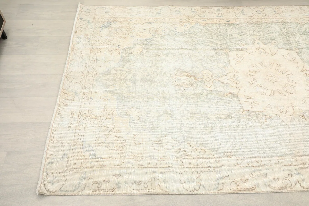 Angled view highlighting the overall distressed appearance and central design