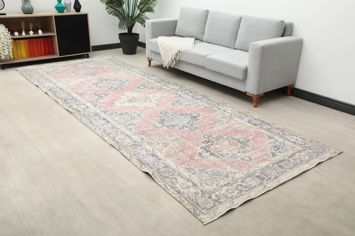 Angled view of the runner rug in a home setting, highlighting its colors and design