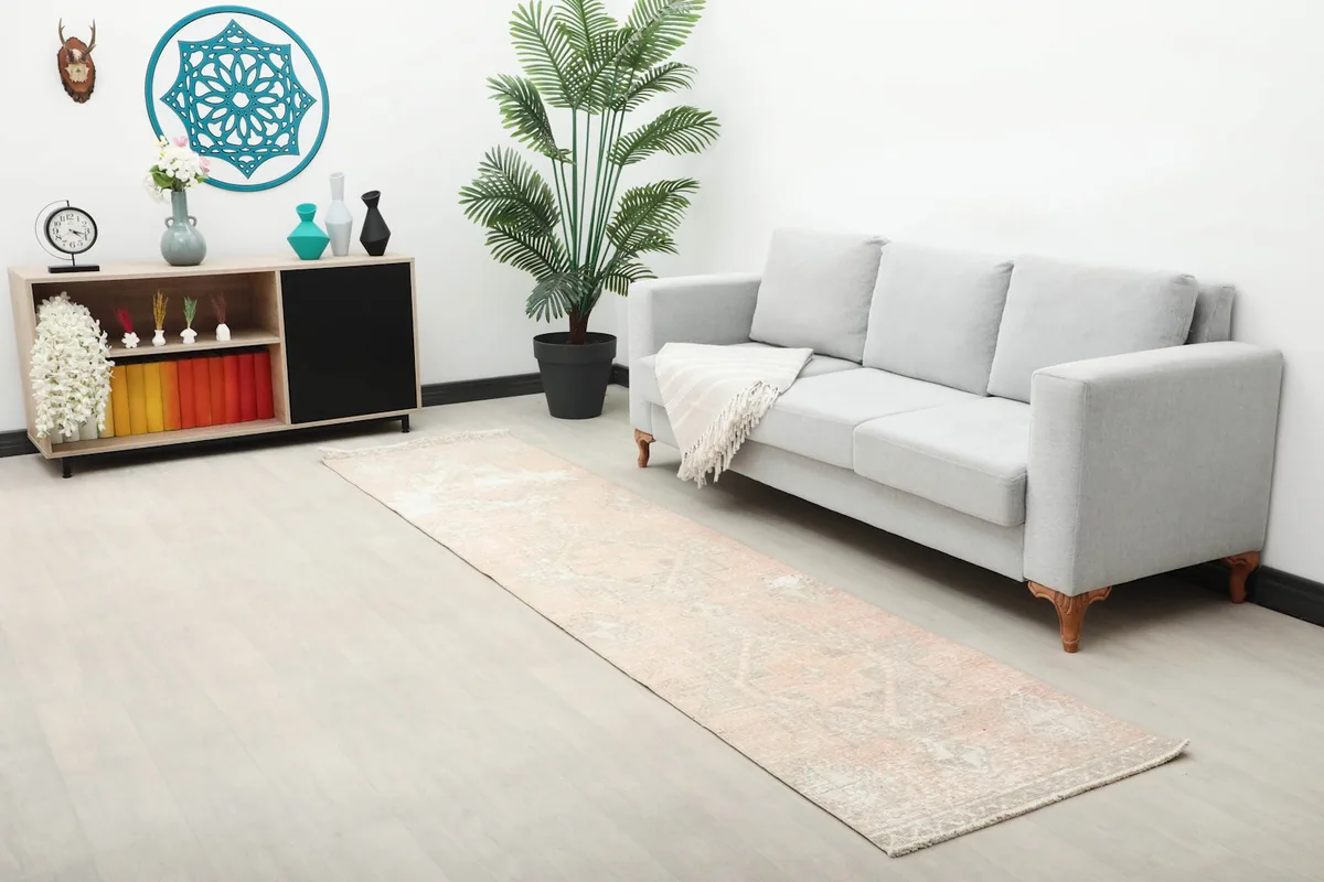 Long view of the rose and gray runner rug in a modern living space