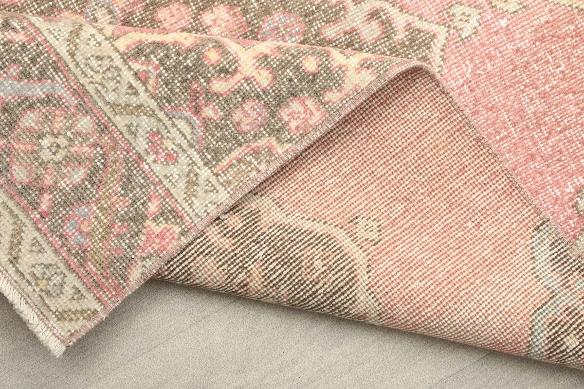 Underside view of the hand-knotted vintage runner, revealing the craftsmanship and material.