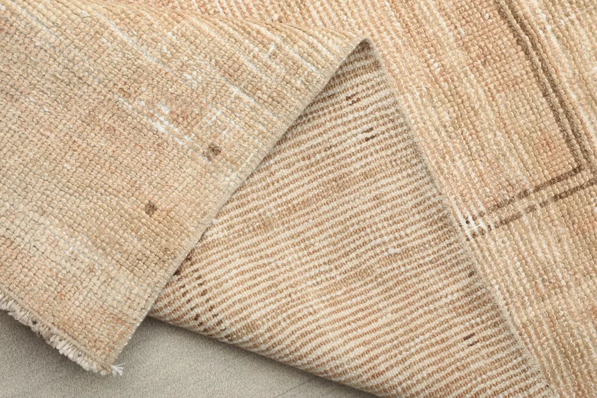 Another angle of the rug's back, highlighting the tight hand-knotted construction