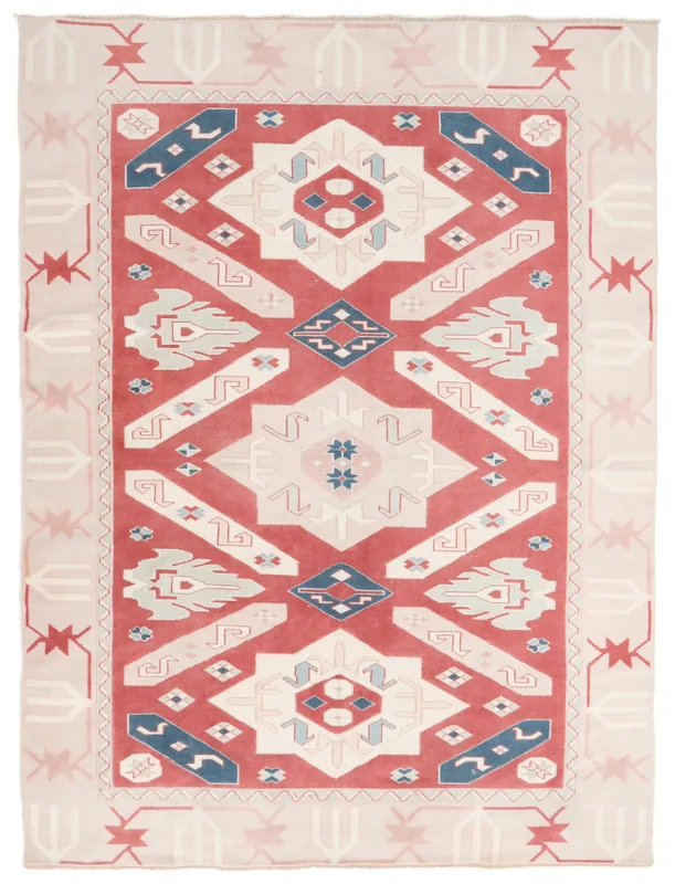 Full top view of the 6'4" x 8'8" red and ivory geometric vintage Anatolian rug on a white background