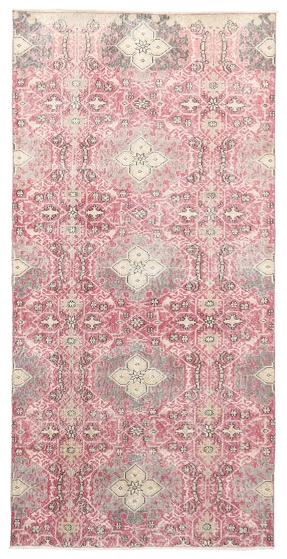 Top-down view of the 4'6" x 9'1" rose and gray vintage Anatolian rug with geometric patterns