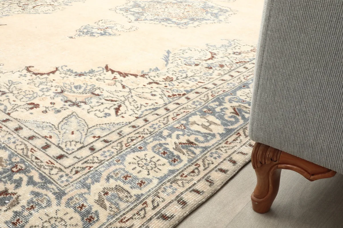 Rug placed under a sofa, showing how it fits into a living area