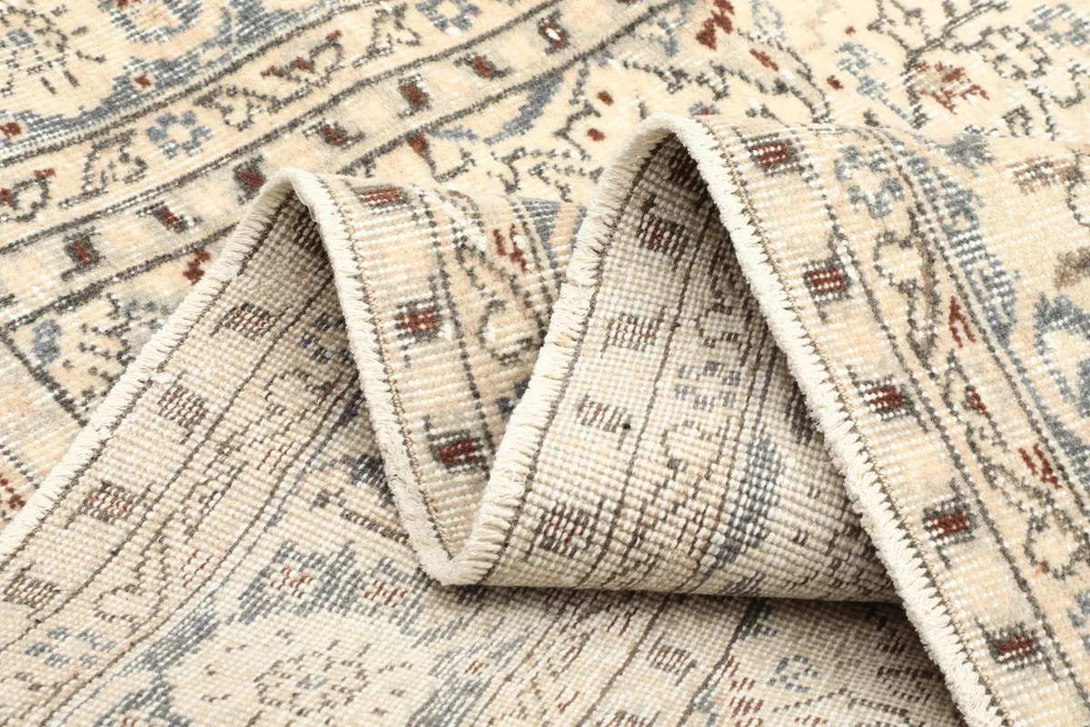 Side view of the rug folded, showcasing its construction